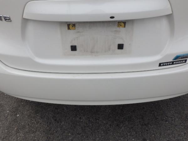 Nissan Note 2014 белый задния бампер