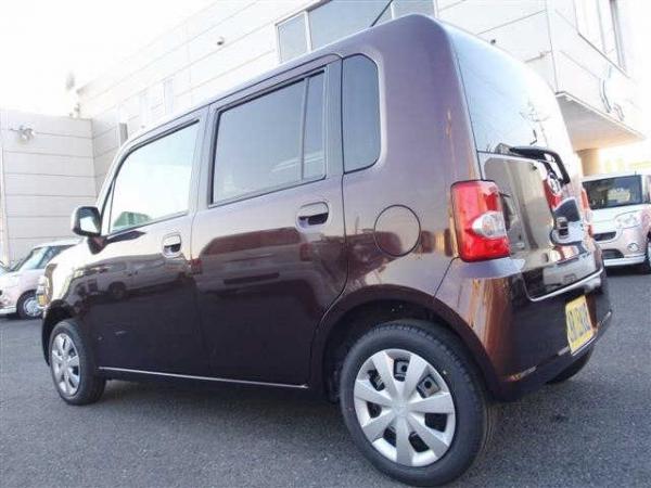 Daihatsu Move Conte 2015 коричневый сзади