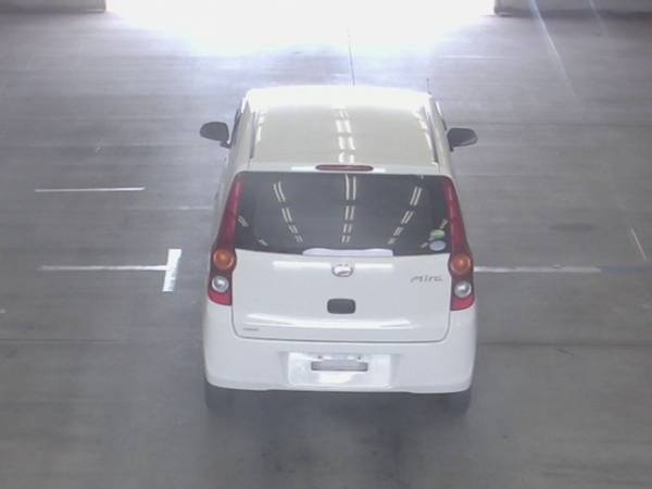 Daihatsu Mira белый сзади